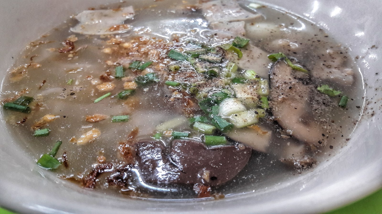 T. Vietnamese noodle soup and grilled pork meatballs.