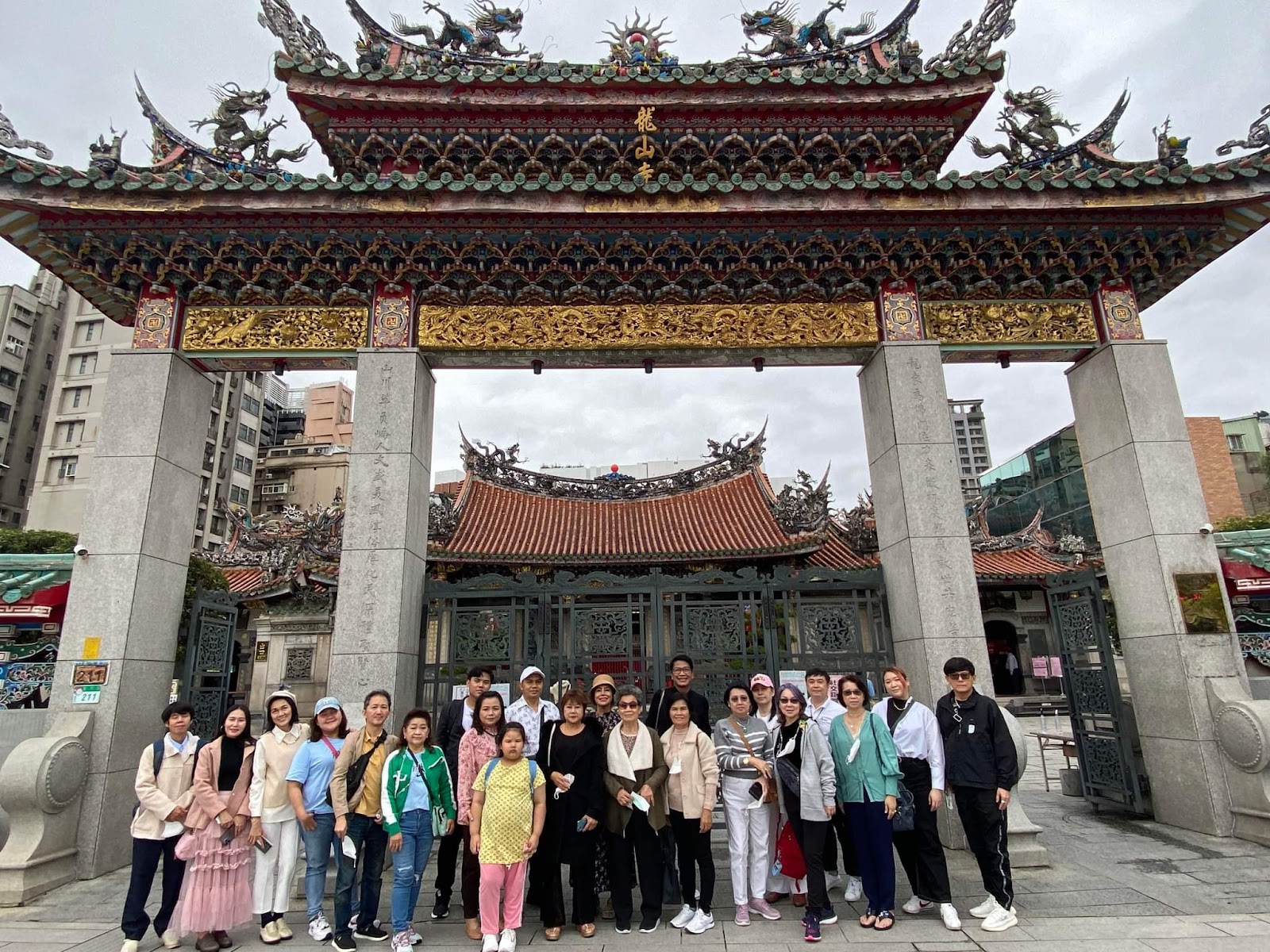 Achan Nok gave a thumbs up.