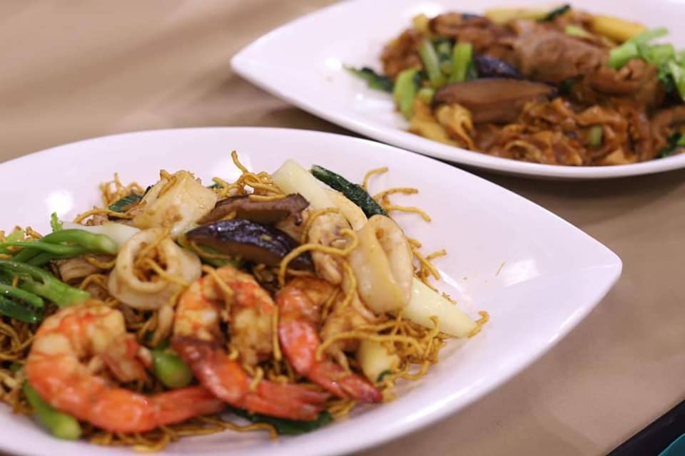 Topped with vegetable sprouts, a 40 year old recipe, Suan Phak 32