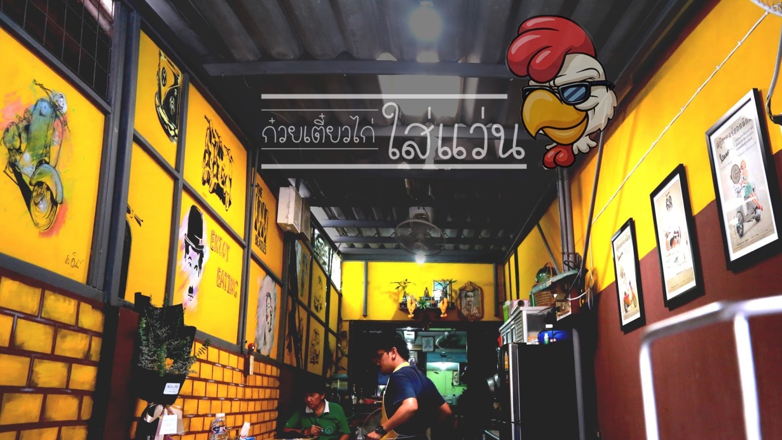 A Chicken Ramen shop owner wearing glasses